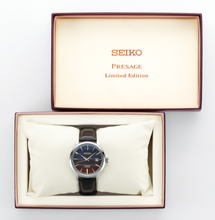 Seiko Presage Cocktail Time Series Automatic STARBAR 'Purple Sunset' Limited Edition SRPK75 SRPK75J1 SARY239. Features a stunning purple dial inspired by the hues of a sunset cocktail, with a stainless steel case and bracelet. The watch includes elegant silver-tone hands and markers and a see-through case back. Limited edition model, perfect for collectors. Available at Watchoutz.com, enjoy fast and secure international shipping and enhance your seamless online horology shopping experience.