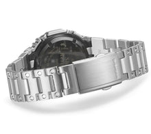 Buy the Casio G-Shock Full Metal 2100 Series Solar-Powered Watch with Smartphone Link (Model GMB2100D-1A) in a sleek, silver-tone design. This robust and cutting-edge timepiece is perfect for both casual and formal wear. Available on Watchoutz.com, the best online watch shop for authentic Japanese watches. Experience fast international shipping and join countless satisfied customers who have enriched their horology collections with our genuine watches