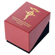 Collector’s box with Fullmetal Alchemist artwork, wrapped in scarlet paper inspired by Edward Elric's trademark red coat.