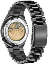Caseback view of Citizen Tsuyosa Mechanical Automatic NJ0155-87E watch showing exhibition window with visible automatic movement, stainless steel black IP finish, and engraved specifications around the rim.