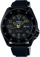 Seiko X Bruce Lee 5 Sports 55th Anniversary SKX Sense Style Limited Edition Watch, model SRPK39 SBSA239 SRPK39k1. Features black case and leather strap inspired by Bruce Lee's Kung Fu uniform, golden dragon motifs, additional yellow and black nylon strap, and dragon motif dial. Includes commemorative box and postcard. Limited to 5,000 pieces, with "Jeet Kune Do" core symbol on case back. Available now at Watchoutz.com: fast shipping, exceptional customer service, seamless shopping experience, and community