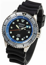 Seiko Prospex X Subaru Collaboration Automatic 200M Diver Limited Edition JDM SZEL010. Limited edition of 300 pieces. Features 200m water resistance, high-quality silicon band, JIS/ISO compliance for magnetic/shock resistance, automatic movement with 41-hour power reserve. Inspired by SUBARU’s design with blue dial, hexagon pattern, and Hawk Eye elements. Available on Watchoutz.com, best online watch shop, fast intrernational shipping, genuine products only, satisfy customers from worldwide