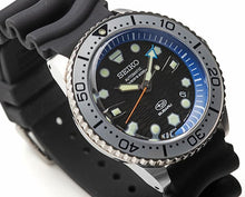 Seiko Prospex X Subaru Collaboration Automatic 200M Diver Limited Edition JDM SZEL010. Limited edition of 300 pieces. Features 200m water resistance, high-quality silicon band, JIS/ISO compliance for magnetic/shock resistance, automatic movement with 41-hour power reserve. Inspired by SUBARU’s design with blue dial, hexagon pattern, and Hawk Eye elements. Available on Watchoutz.com, best online watch shop, fast intrernational shipping, genuine products only, satisfy customers from worldwide